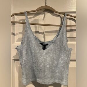 Blue Cropped Tank Top
Size Large